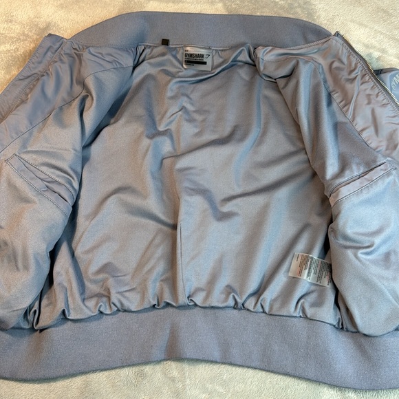 🎯NWOT Gymshark Lo Bomber Jacket Steel Blue Size Small - Picture 5 of 12